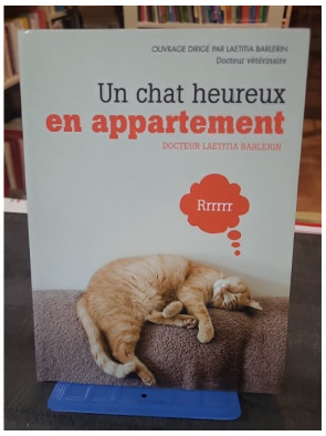 Un chat heureux en...