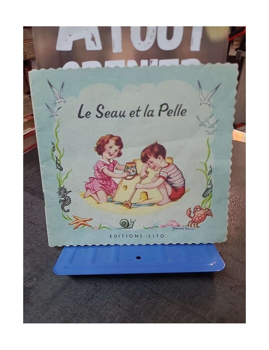 Le Seau Et La Pelle. - Livre pour enfants illustré par COLLECTIF